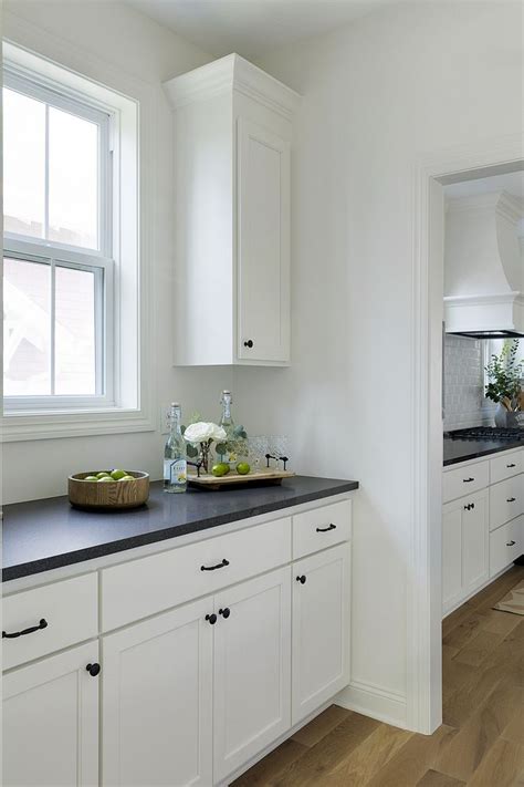 Benjamin Moore Oc 17 White Dove Kitchen Cabinet With Honed Black