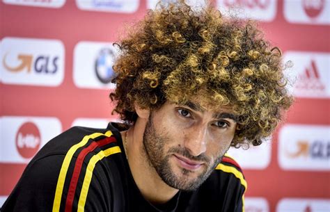 Sports world reacts with shock & awe to fellaini afro chop (photos). La nouvelle coupe de Marouane Fellaini, l'oeuvre du ...