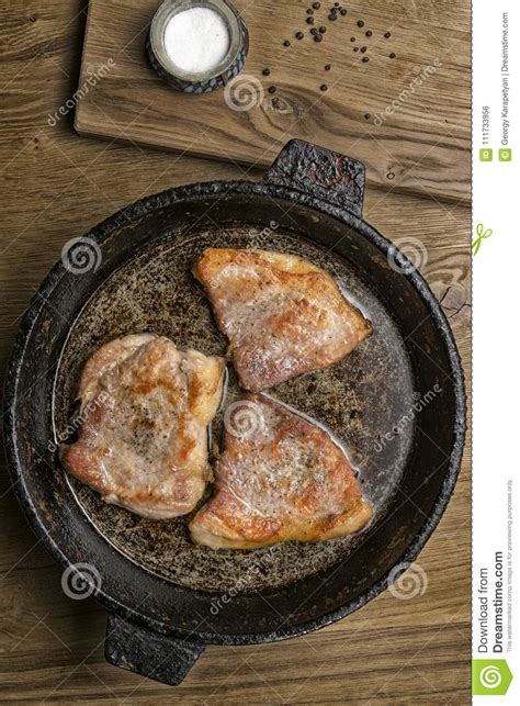Three Fried Pork Steaks In A Frying Pan Stock Photo Image Of Pork