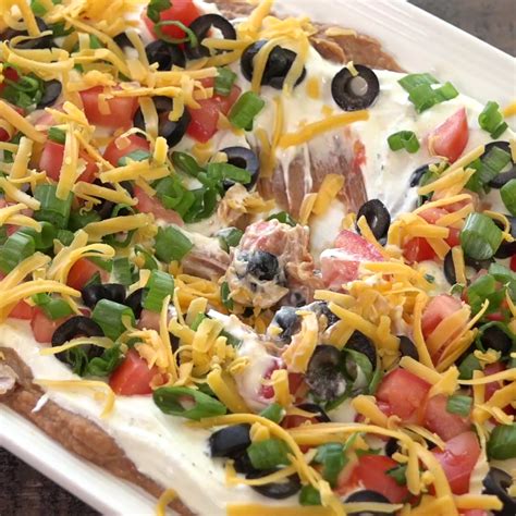 Layered Ranch Taco Dip Layers Of Refried Beans Sour Cream With Ranch
