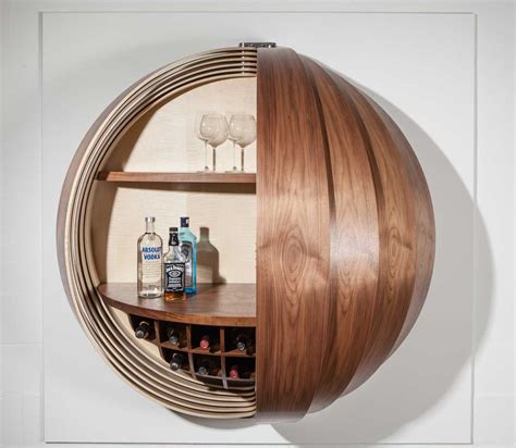 Wall mounted bar cabinets for home. A Wall-Mounted Bar Cabinet Inspired by a Spinning Coin