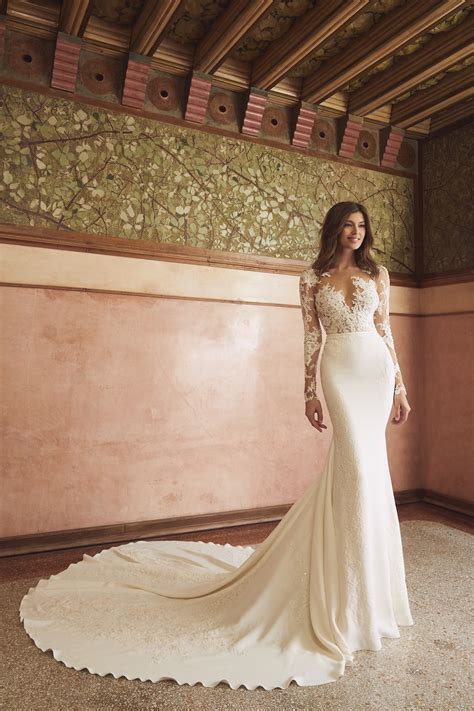 New dresses kleinfeld exclusives plus size disney fairy tale weddings collection same day styles. Long Sleeve Illusion Neckline Lace Bodice Sheath Wedding ...