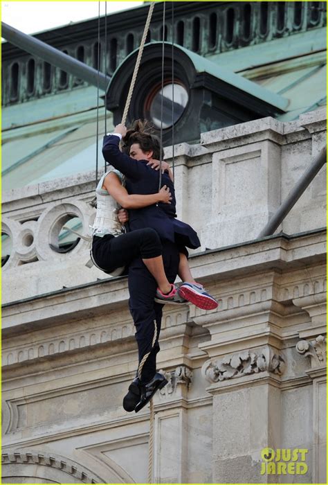 Tom Cruise Hangs In The Air With A Stunt Woman For MI Photo Mission Impossible