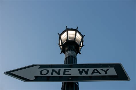 Free Stock Photo Of One Way Sign On Street Light Pole