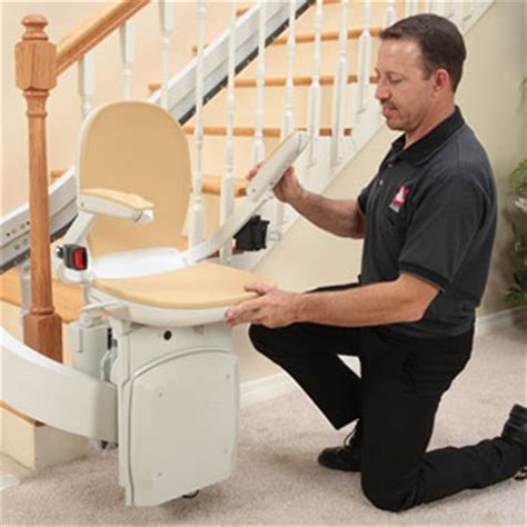 Red leaf stair chair lift. LA StairLift