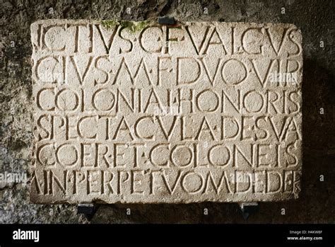 Pompeii Amphitheatre - Latin inscription Stock Photo - Alamy