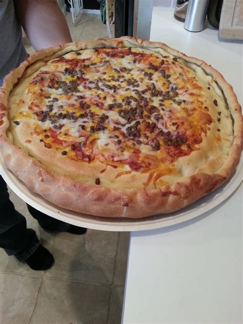 We specialize in two styles: Papa Murphy's Take N Bake Pizza | Pizza Restaurants Near Me