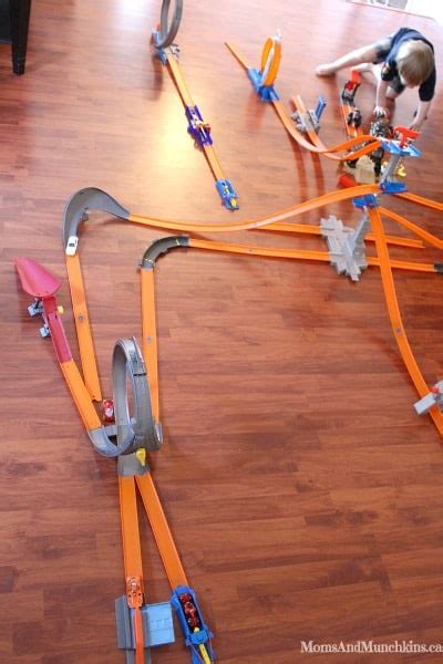 I built a wall mount for standard hot wheels tracks to mount to the wall. Hot Wheels Track Builder Challenge - Moms & Munchkins