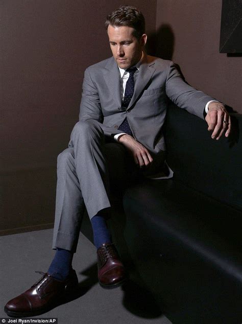 he s still got it ryan reynolds was at his smouldering best as he posed for his official