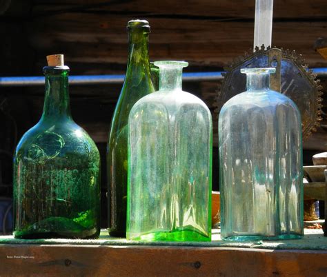 Four Old Bottles Free Stock Photo Public Domain Pictures