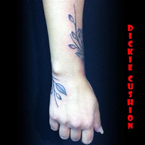 Which is the best girly flower wrist tattoo? Pin by amber harris on Tattoos | Hand tattoos, Wrap around ...