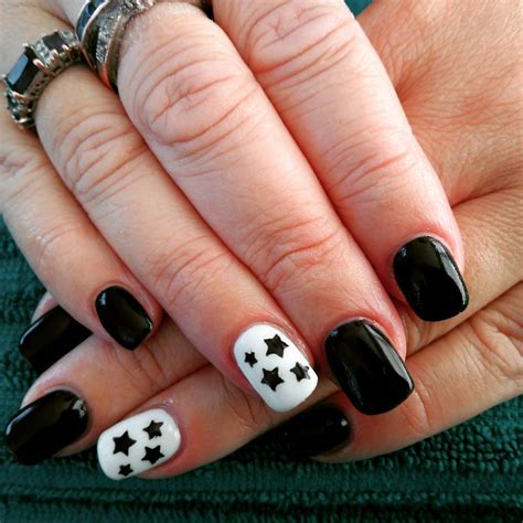 Yellow, black and white is one of the biggest independent studios based in russia focusing on the production of movies and tv programs. 29+ Black And White Acrylic Nail Art Designs , Ideas ...