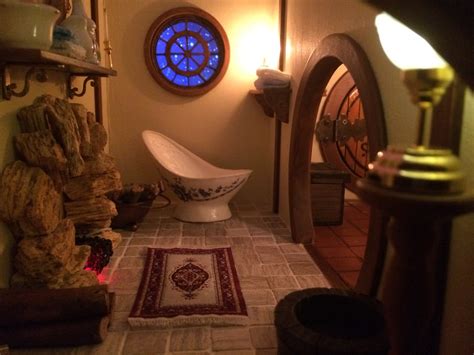 If hobbits were ever interested in leaving behind their hillside abodes and moving to the trees, the end result would probably be quite similar to suzanne dege's hobbit house. My Miniature Bag End The Hobbit Hole