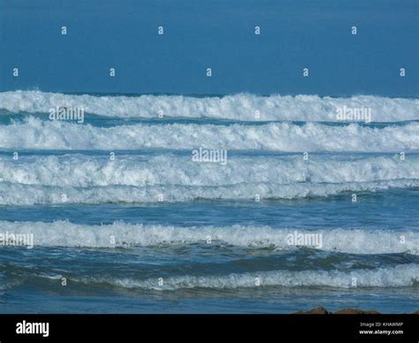 Rolling Wave Breakers Off The Shoreline At Newquay Cornwall Stock