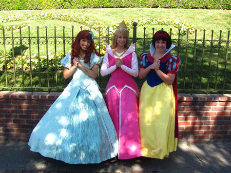 Ariel Aurora And Snow White At The Disneyland Main Gate A Photo On