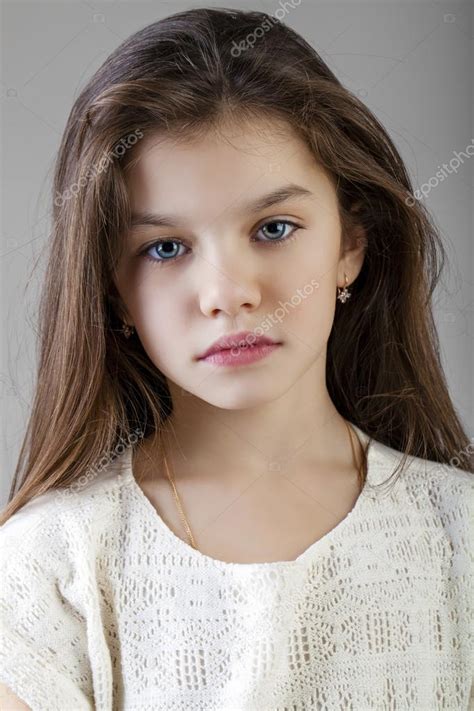 Portrait Of A Charming Brunette Little Girl — Stock Photo © Arkusha