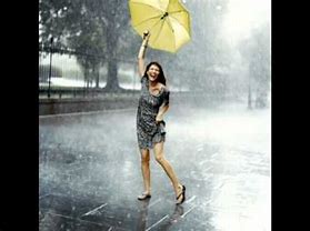 Image result for pictures of people enjoying rain