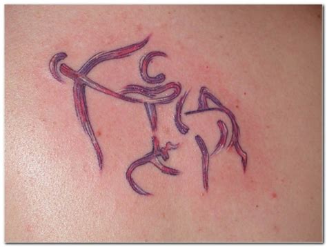 Perfect tattoo for me because my husband's leo and i'm sagittarius. An Original Sagittarius Tattoo