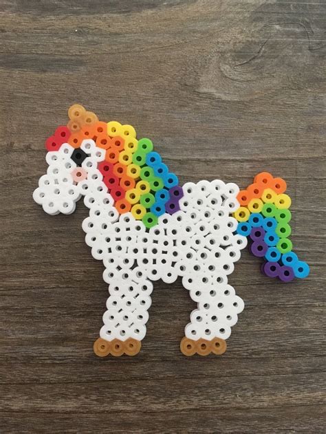 Each download includes a pattern for 51 emoji's, thread colour and number of skiens. Perler Beads Unicorn | Perler crafts, Fuse beads, Perler ...