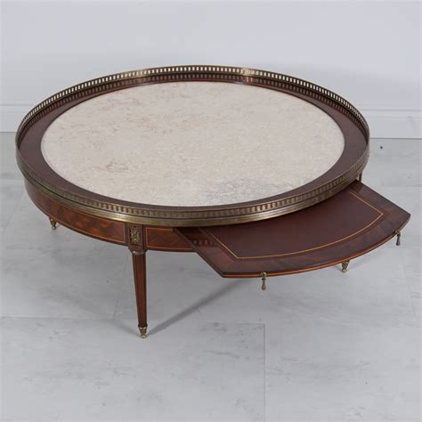 Mixes with other periods seamlessly. Louis XVI Parquetry Round Coffee Table | Jansen Furniture