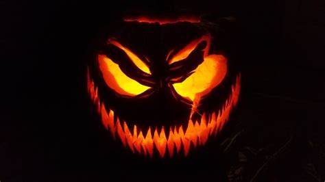 Scary Pumpkin With Sharp Teeth And A Scar Pumpkin Pumpkin Carving