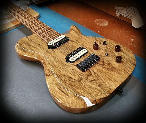 Kiesel Guitars Carvin Guitars Scb7 With A Black Limba Top And Black