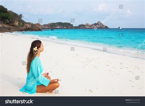Young Girl Relaxing On Tropical Beach Stock Photo