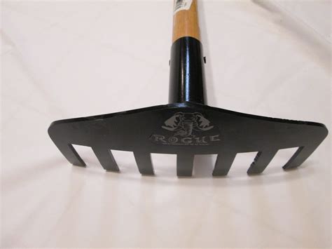 It removes up to 80% of needles, leaves, twigs and other fine ground debris without damaging your living plants, but it's strong enough to quickly pile and move rocks and large branches, too. 115FR - 11.5″ Rake | Rogue Hoe Distributing, LLC