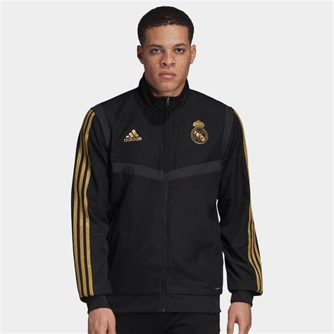 Ein trainingsanzug mit dem wappen des real madrid auf der brust und logo auf dem oberschenkel. Adidas Real Madrid Trainingsanzug Herren Schwarz Fußball ...