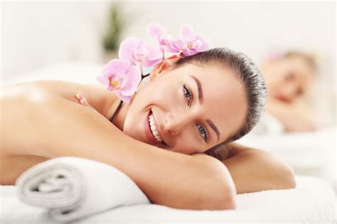 premium photo two beautiful women getting massage in spa