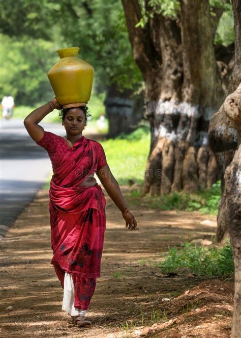 indian woman carries pot of water on her head editorial image image of vase carry 38641150