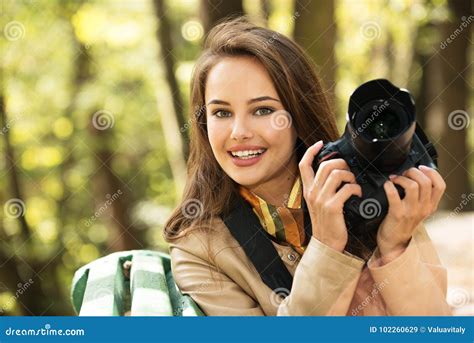 Woman Is A Professional Photographer With Photo Camera Stock Image