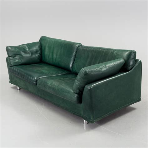 A Fredrik Green Leather Sofa By Dux Bukowskis