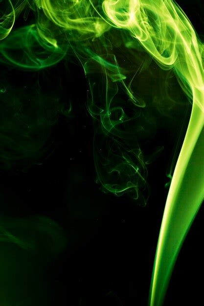 Premium Photo Green Smoke On Black Background
