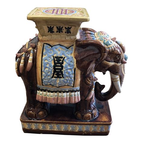 Gold ceramic stand potted plant. Mid-Century Ceramic Elephant Plant Stand | Chairish