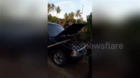 Deadly King Cobra Pulled Out From Inside Car Bonnet With Sticks In