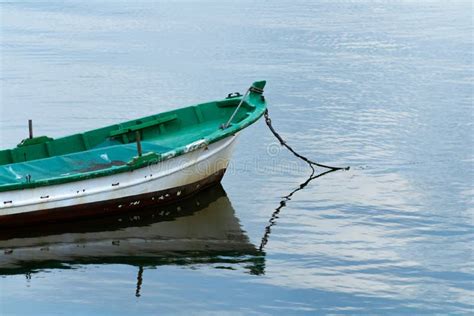 Fishing Boat On Calm Sea Alone Stock Image Image Of Rowboat River