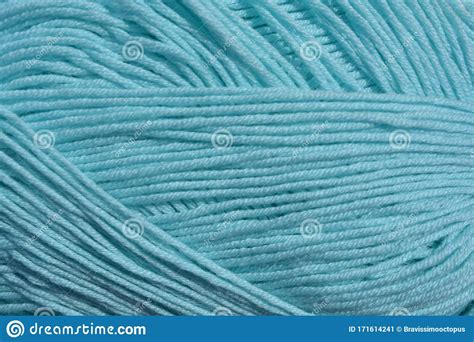 Background Pattern Made With Light Blue Wool Wavy Soft Fiber Yarn For