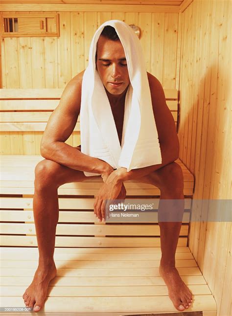 Young Man Wearing Towel In Sauna Photo Getty Images
