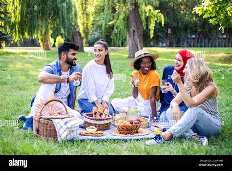 Best Friends Are On Picnic In The Park Stock Photo Alamy