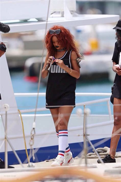 Rihanna Shows Off Her Wild Red Hair While Out During Her Vacation On