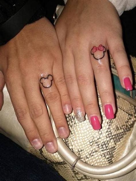 If you don't know how to finger yourself and get yourself off, your partner will not know either. Mickey and Minnie ring finger tattoos...for the cutie pie ...