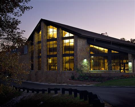 Stone and oak timbered rustic lodge and cabin facilities; Abe Martin Lodge | Community Architect | Schmidt Associates