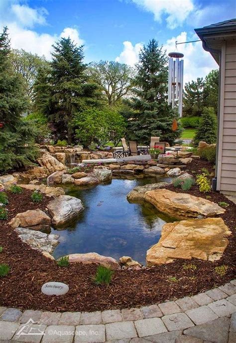 25 Stunning Backyard Ponds Ideas With Waterfalls 21