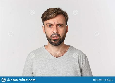 Close Up Of Handsome Confused Guy Cant Understand Something Frowning