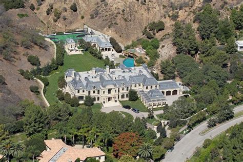 After five years of planning in 2009 mark wahlberg purchased six acres of land for $8m in the exclusive los angeles neighborhood of beverly park. Mark Wahlberg Third Nipple, Tattoos, House