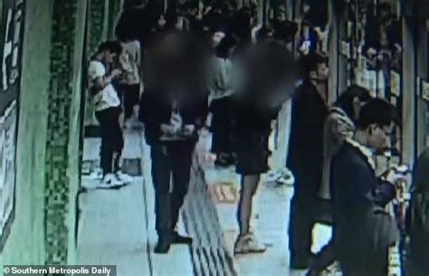 Pervert Caught Taking Upskirt Pictures Of A Woman At A Subway Station