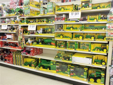 Wall of John Deere Toys at Tractor Supply