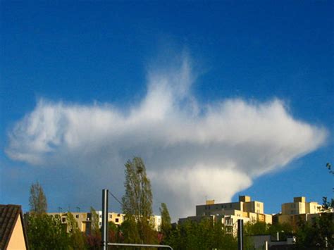 A Cumulonimbus Cloud Advancing Over A Suburban Neighborhood Science