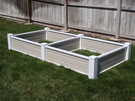 The raised garden bed is a boxy unit that allows you to plant flowers, herbs, and vegetables just about anywhere outdoors. Vinyl Raised-Bed Garden Planters (With images) | Raised ...